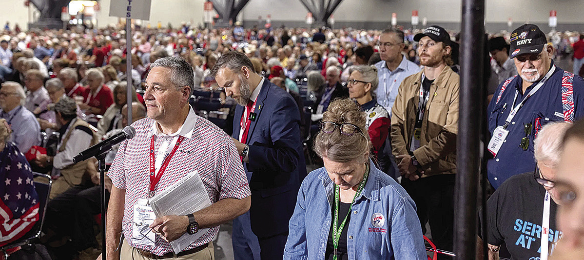 Delegates line up to speak on legislative priorities at the 2026 Texas State Republican Convention on June 13, 2026 in Houston. Eddie Gaspar/The Texas Tribune