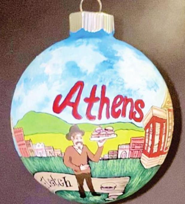 Representative Keith and Annette Bell Place Athens-Inspired Ornament on Capitol Christmas Tree