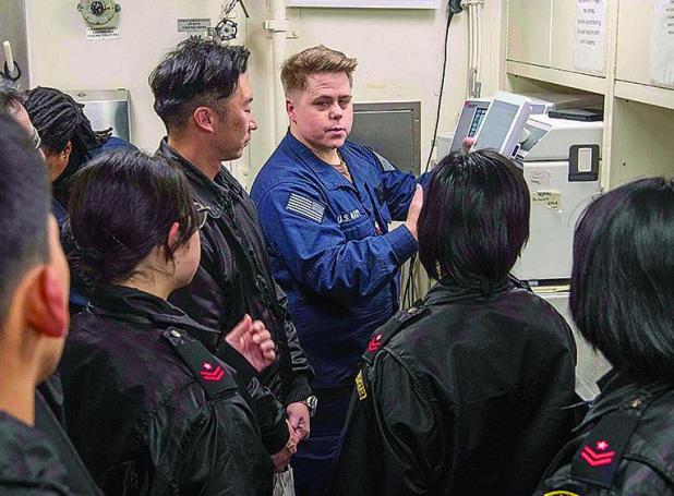 Mesquite Native Gives a Tour Aboard USS America to Japan Maritime Self-Defense Force Sailors