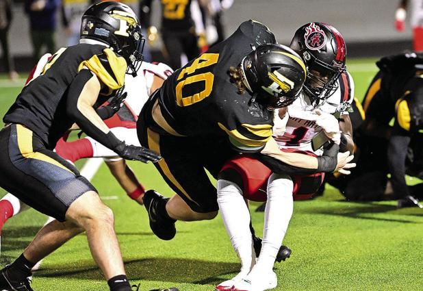 Forney Beats Port Arthur 44 to 7 in First Playoff Game