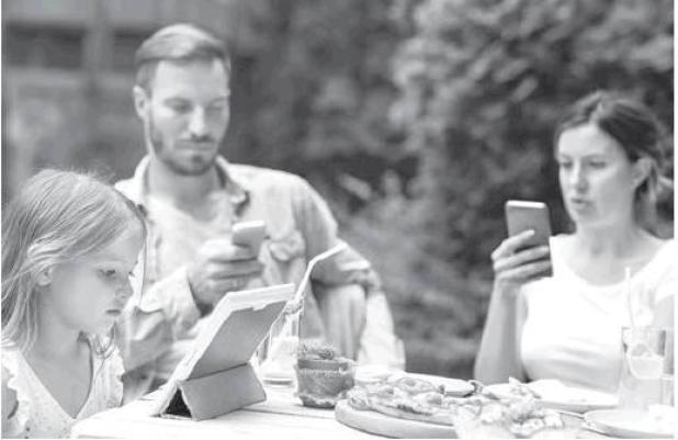 Parents as Guilty as Kids When it Comes to Too Much Screen Time