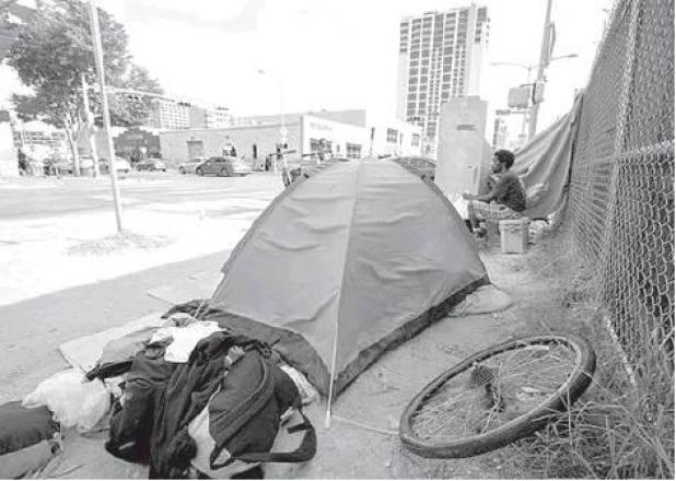 Gov. Greg Abbott Says Texas Will Temporarily House Homeless Austin Residents on Five Acres of State Land