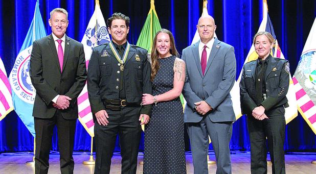 Pictured (L-R): CBP Commissioner Rodney S. Scott, CBPO/EMT Daniel Zmolik and wife Laurali Zmolik, Deputy Commissioner Ronald D. Vitiello, Executive Assistant Commissioner Diane J. Sabatino – Office of Field Operations