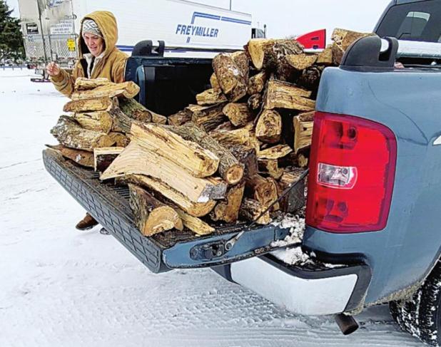 Local Couples Brave Cold to Deliver Free Firewood
