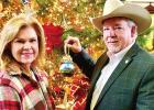 Representative Keith and Annette Bell Place Athens-Inspired Ornament on Capitol Christmas Tree